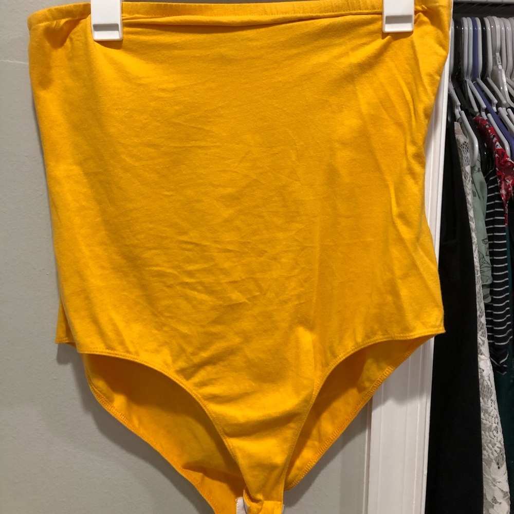 Yellow body suit
